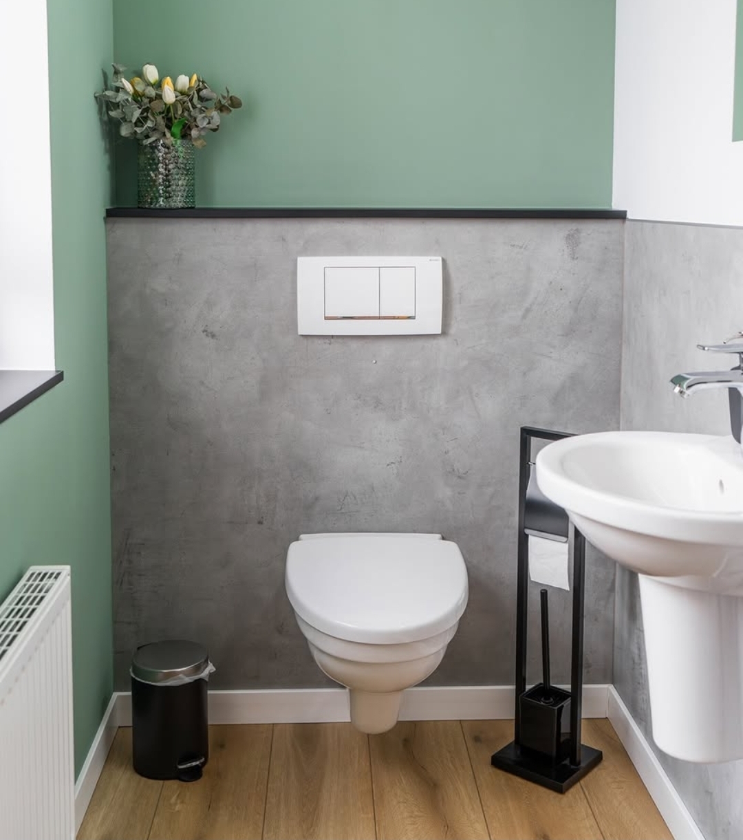 Fugenlose Wandgestaltung in Betonoptik hinter Wand-WC